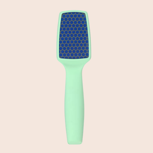 Mint green nano-glass foot file against a light background.