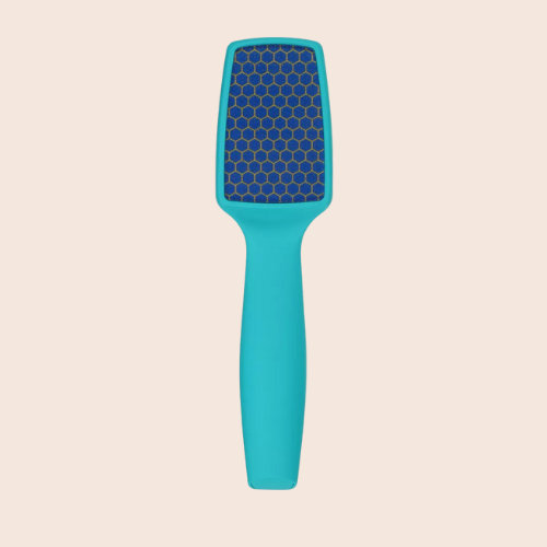 Teal nano-glass foot file against a light background.