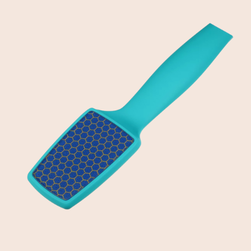Teal nano-glass foot file with fine abrasive surface centered on a light background.